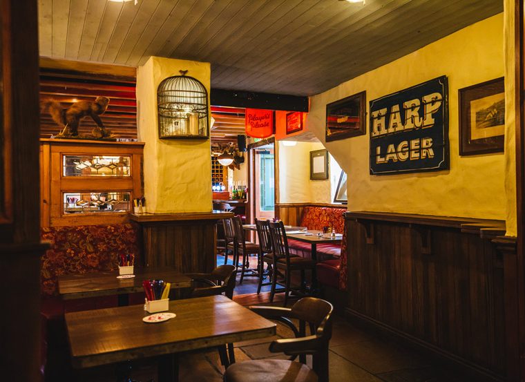 The Cock Tavern Swords back bar